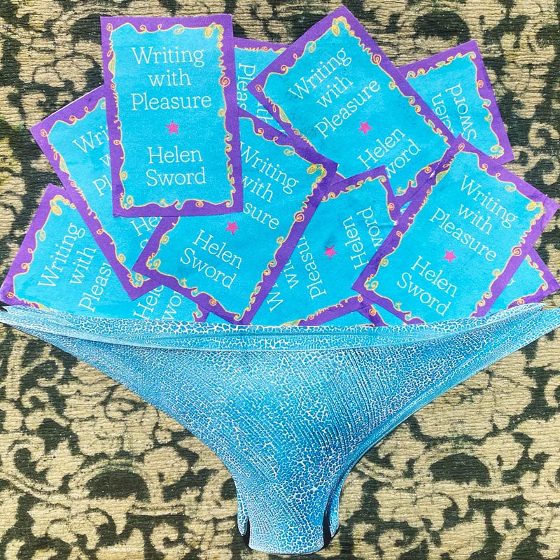 paper collage depicting a bowl full of books