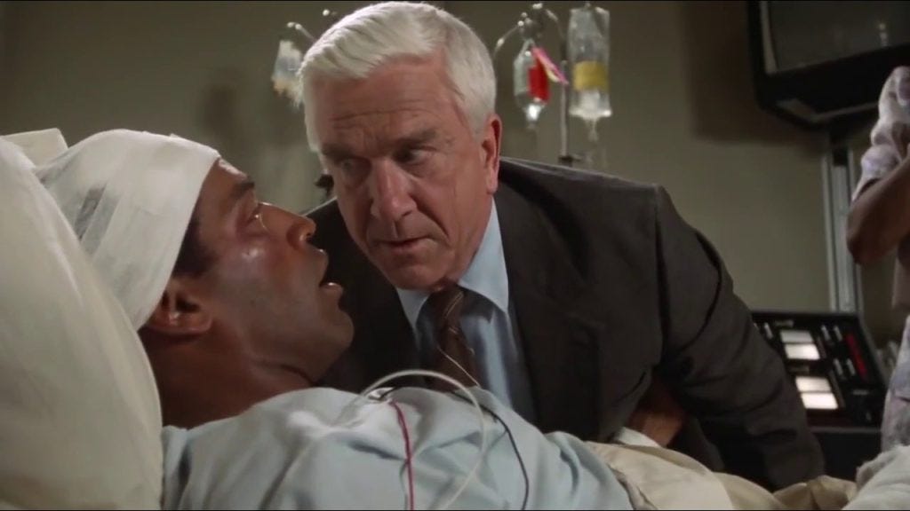 The Naked Gun: From The Files Of Police Squad! (1988) - Ruthless Reviews