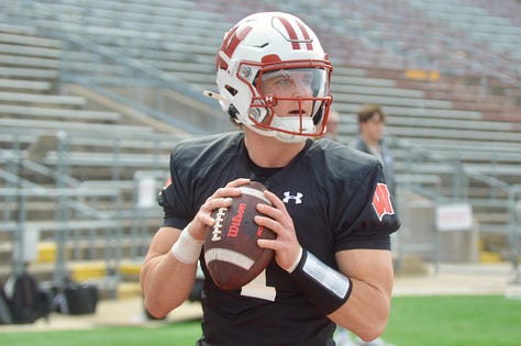 Wisconsin quarterbacks participate in individual position drills during Saturday's spring practice inside Camp Randall Stadium.