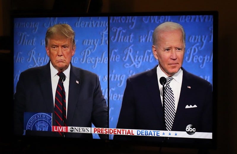 Split screen of Trump - Biden at their debate