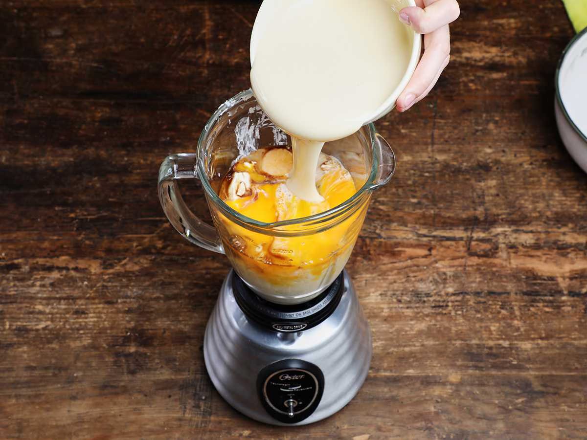 adding sweetened condensed milk to blender adding sweetened condensed milk to blender