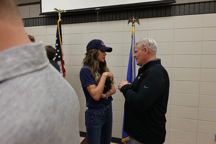 State Senator Sydney Davis stands with Gov. Noem staffer Ben Koisti during a briefing. Gov. Kristi Noem talks with locals after a press conference in Dakota Dunes. (Joe Sneve/The Dakota Scout)
