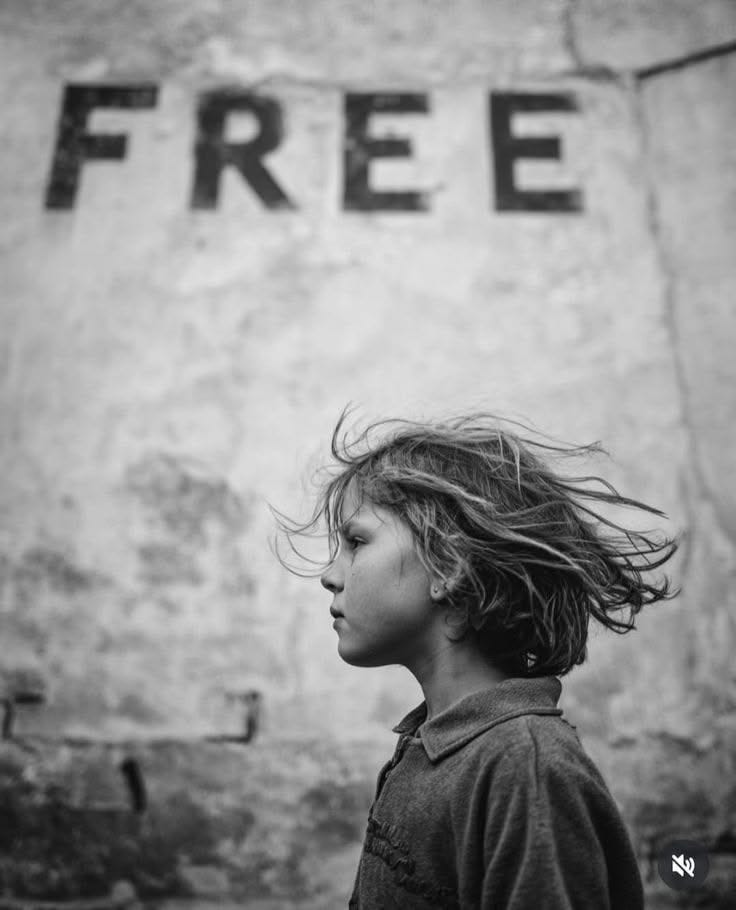 May be a black-and-white image of child and text that says 'FREE E' May be a black-and-white image of child and text that says 'FREE E'
