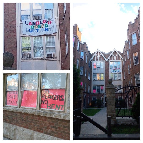 Tenants post protest signs in apartment windows about refusing to pay rent without repairs.