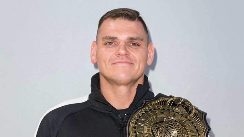 GUNTHER happily poses with his Intercontinental Title