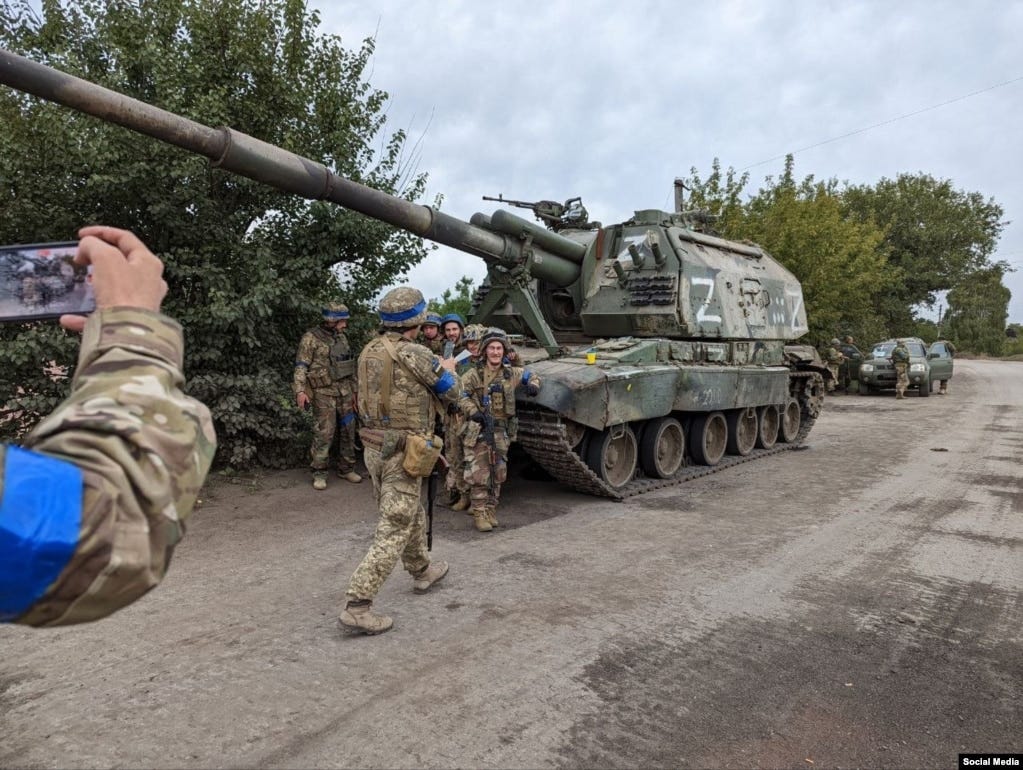 Ukrainian troops gather for a photo around a 2S19 Msta that was reportedly abandoned during the Russian retreat. The self-propelled howitzers are among Russia's most formidable artillery pieces and are valued at around $1.5 million per unit.  Ukrainian troops gather for a photo around a 2S19 Msta that was reportedly abandoned during the Russian retreat. The self-propelled howitzers are among Russia's most formidable artillery pieces and are valued at around $1.5 million per unit. 