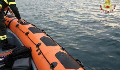 Firefighters search for survivors after a boat capsized in Lake Maggiore, in northern Italy, May 29, 2023