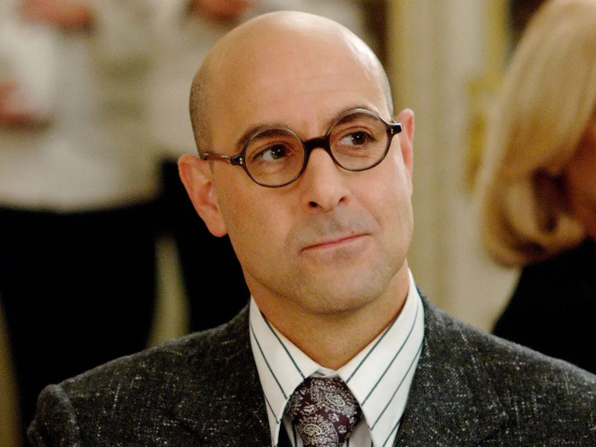 Stanley Tucci as Nigel in The Devil Wears Prada.