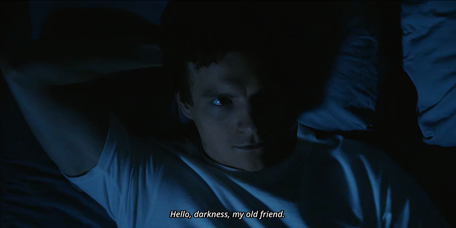 Screengrab from Dexter: Original Sin with young Dexter relaxed in bed, looking up at the ceiling. Caption reads: "Hello Darkness, my old friend."