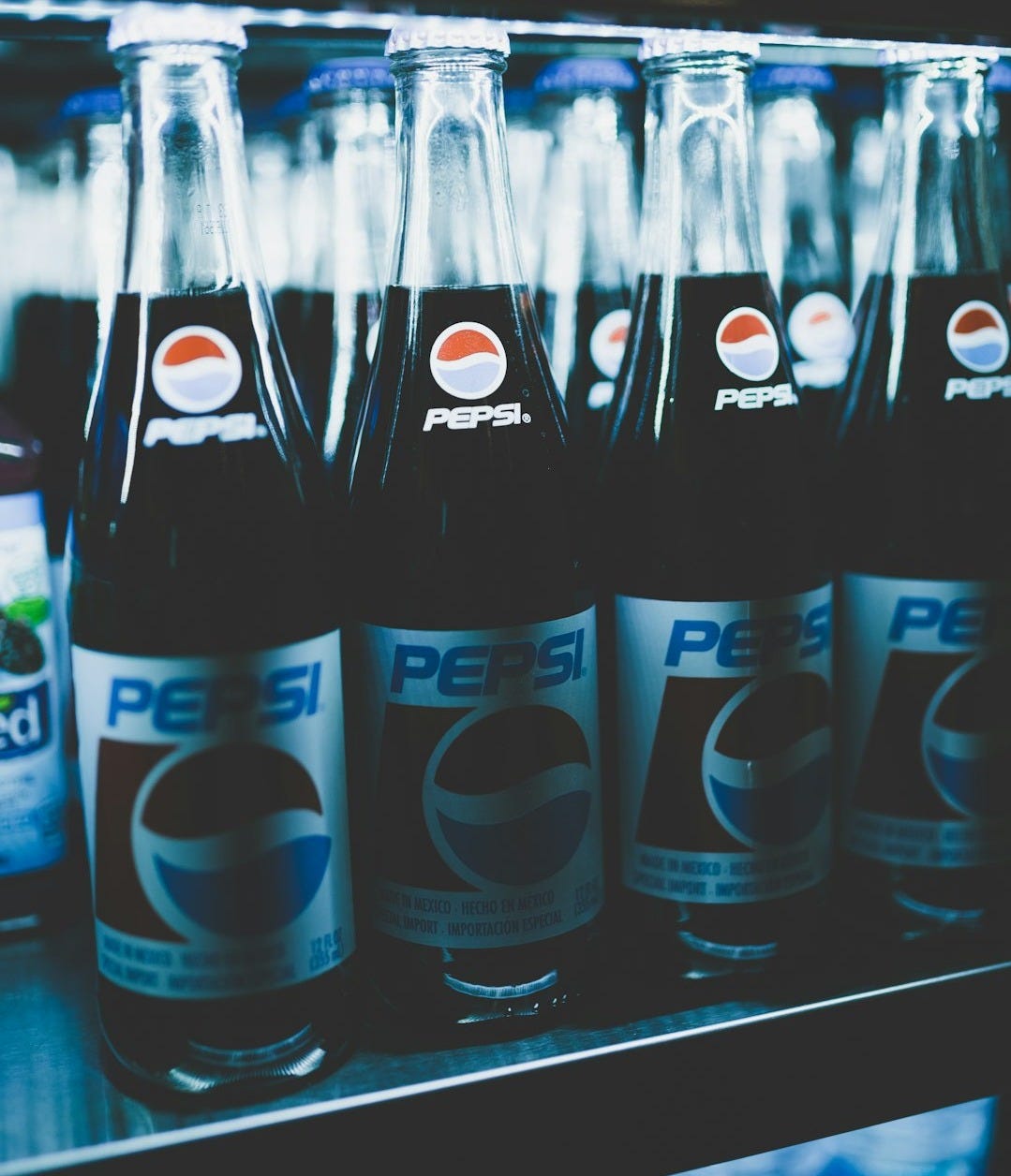 Pepsi bottles on cooler Pepsi bottles on cooler