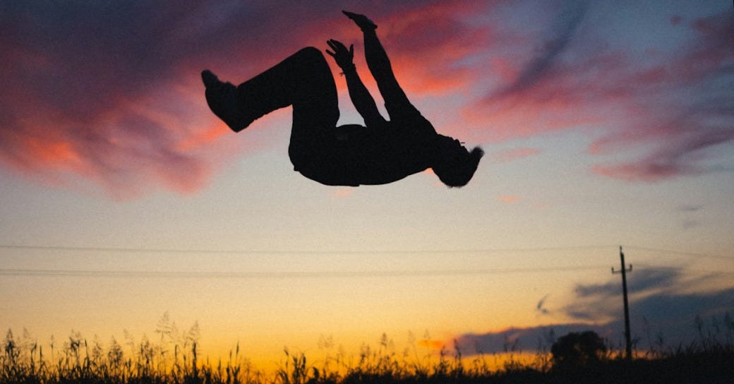 silhouette of person jumping on water during sunset silhouette of person jumping on water during sunset