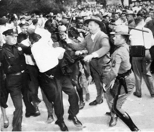 https://www.newyorkalmanack.com/wp-content/uploads/2023/08/Eugene-Bullard-being-beaten-by-police-during-the-Peekskill-Riot-in-1949.jpg