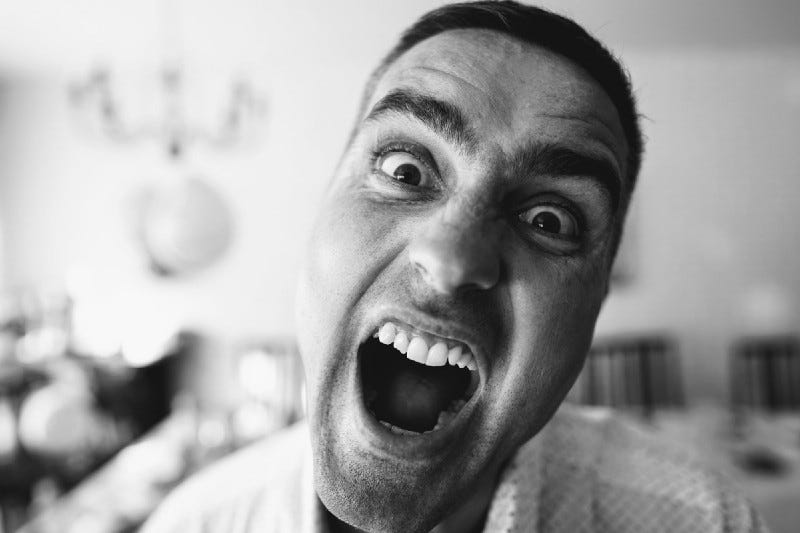An angry man shouting An angry man shouting