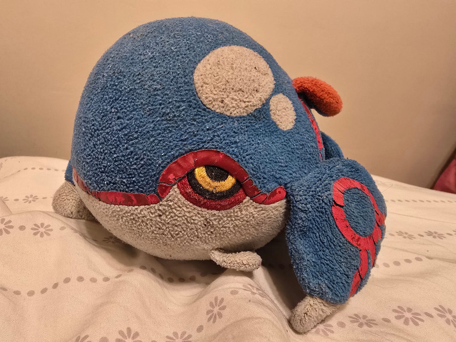 Sarah’s Kyogre “PokéDoll” plush that her parents bought for her from the Pokémon Center New York store
