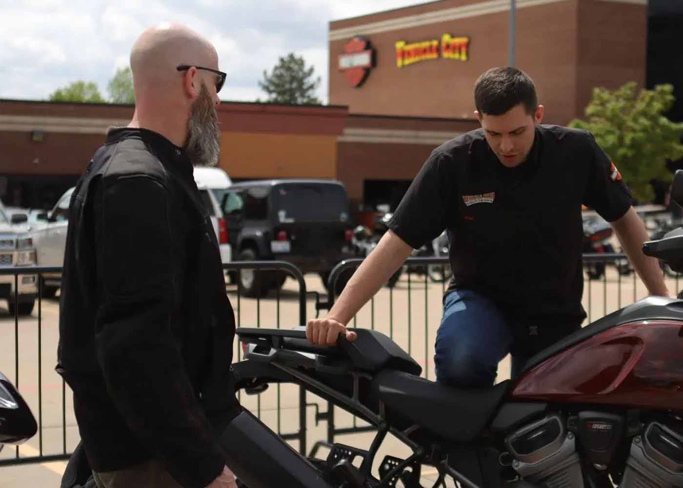 ddr-employee-showing-bike-customer