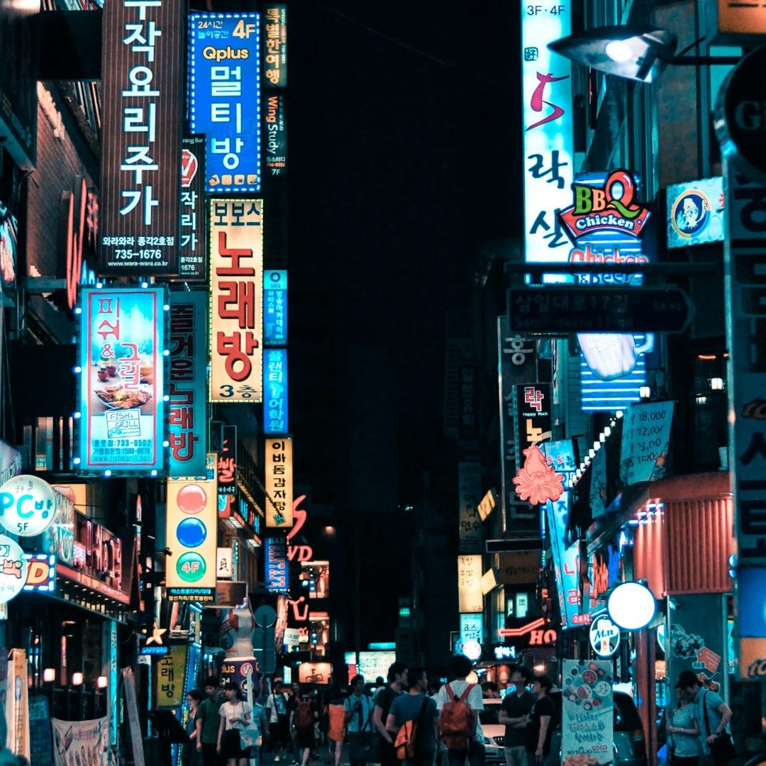 buildings with pathway surround by people buildings with pathway surround by people
