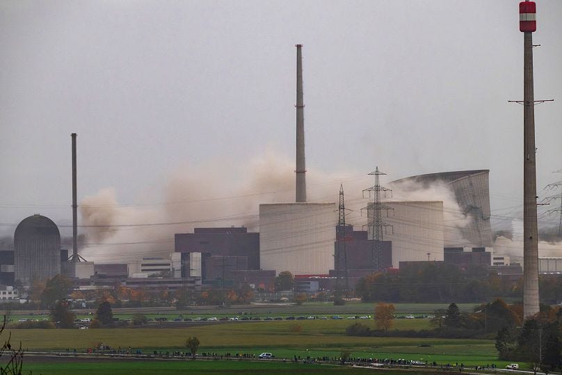 The two cooling towers of the decommissioned Gundremmingen nuclear power plant collapse during their demolition, in Gundremmingen, Germany, Saturday, Oct. 25, 2025. The two cooling towers of the decommissioned Gundremmingen nuclear power plant collapse during their demolition, in Gundremmingen, Germany, Saturday, Oct. 25, 2025.