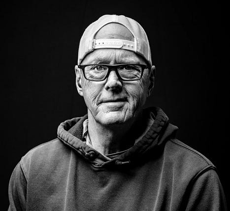 Black and white portrait of man with backwards cap, Clifford Jones Black and white portrait of man with backwards cap, Clifford Jones