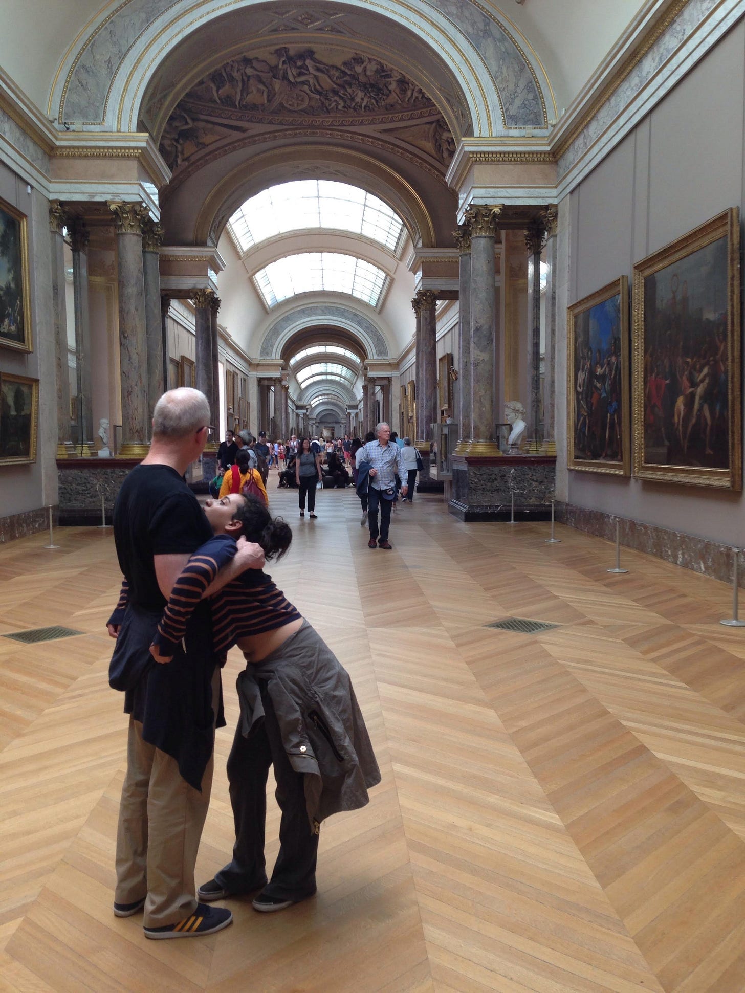 Tired preteen at Louvre museum in Paris Tired preteen at Louvre museum in Paris