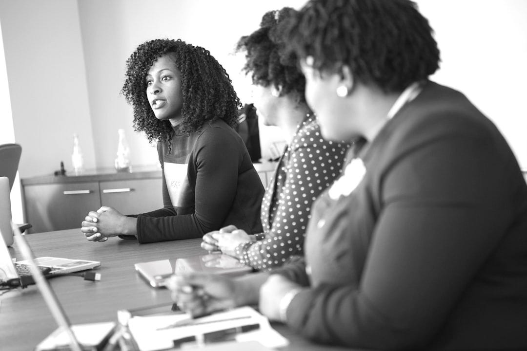 two women looking at talking woman two women looking at talking woman