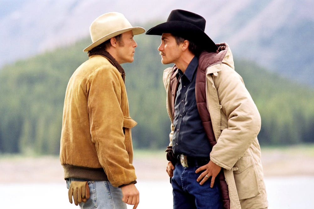 Heath Ledger and Jake Gyllenhaal in an eye-to-eye confrontation in the mountains. Still from Brokeback Mountain. Heath Ledger and Jake Gyllenhaal in an eye-to-eye confrontation in the mountains. Still from Brokeback Mountain.