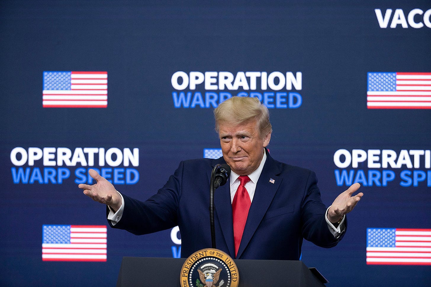 Image may contain Human Person Crowd Suit Coat Clothing Overcoat Apparel Audience Tie Accessories and Accessory Image may contain Human Person Crowd Suit Coat Clothing Overcoat Apparel Audience Tie Accessories and Accessory