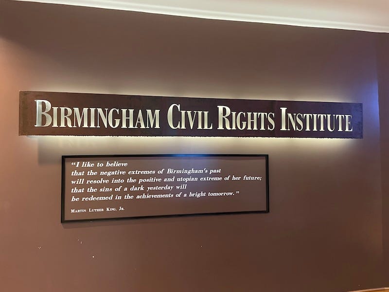 The welcome sign inside the Birmingham Civil Rights Institute includes a quote from Martin Luther King about his hope for the future of Birmingham.