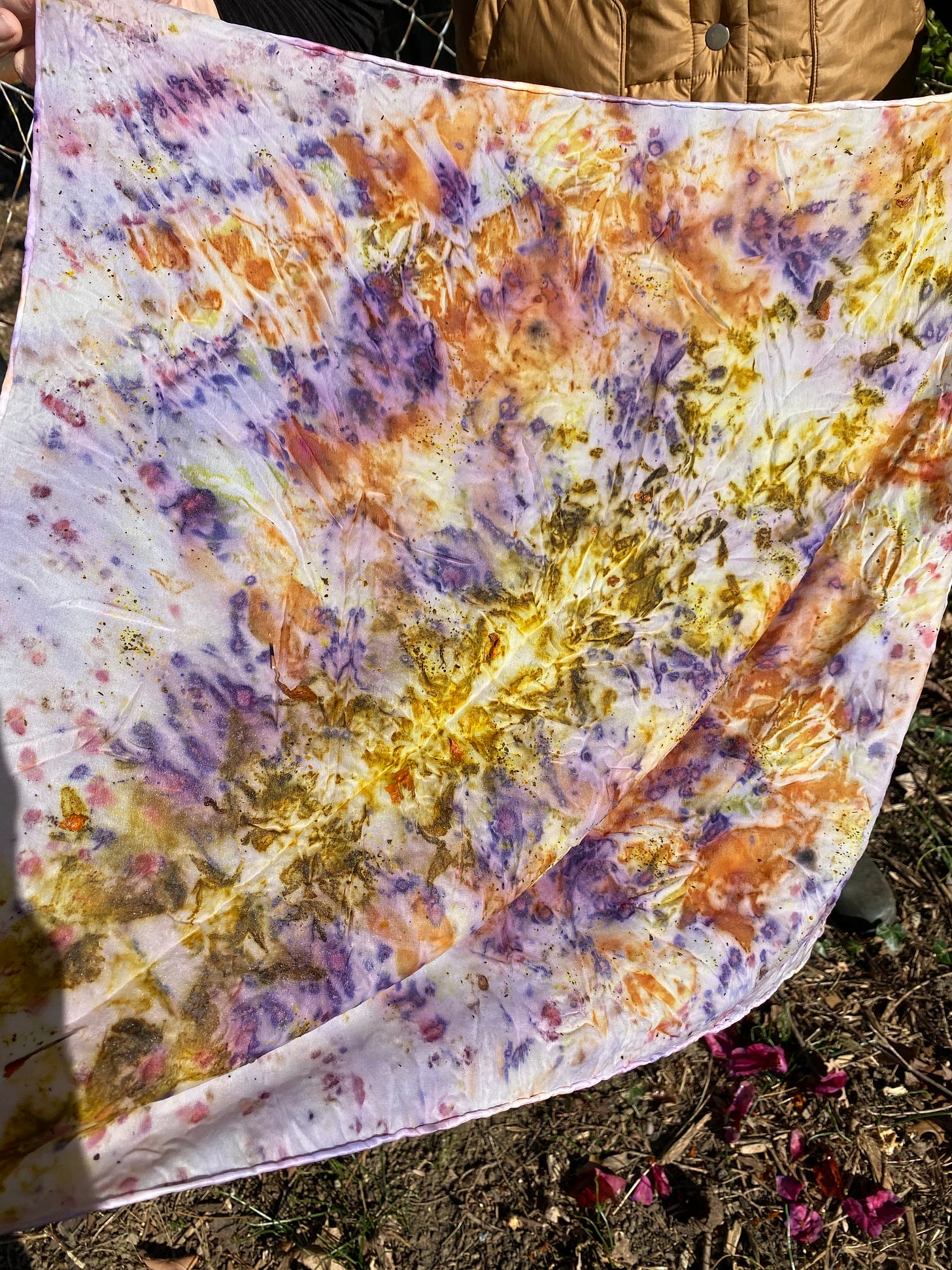 colorful scarf dyed with plants in a mirrored pattern