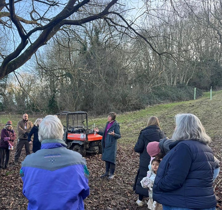 A picture of people planting trees and Bishop of Gloucester Rachel Treweek making a speech about the GARAS tree planting