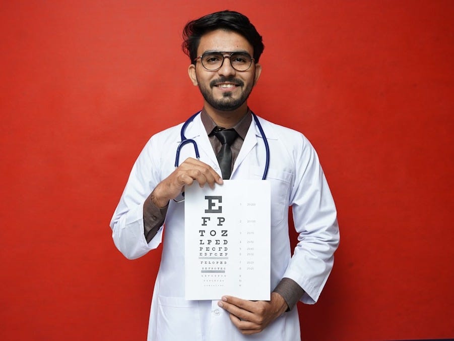 a man holding a piece of paper