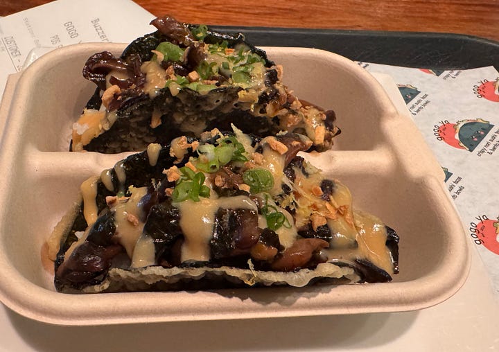 photos of promotional postcard for winter food specials; Asian nori tacos; a large vegan Caesar salad plate; and a hamburger