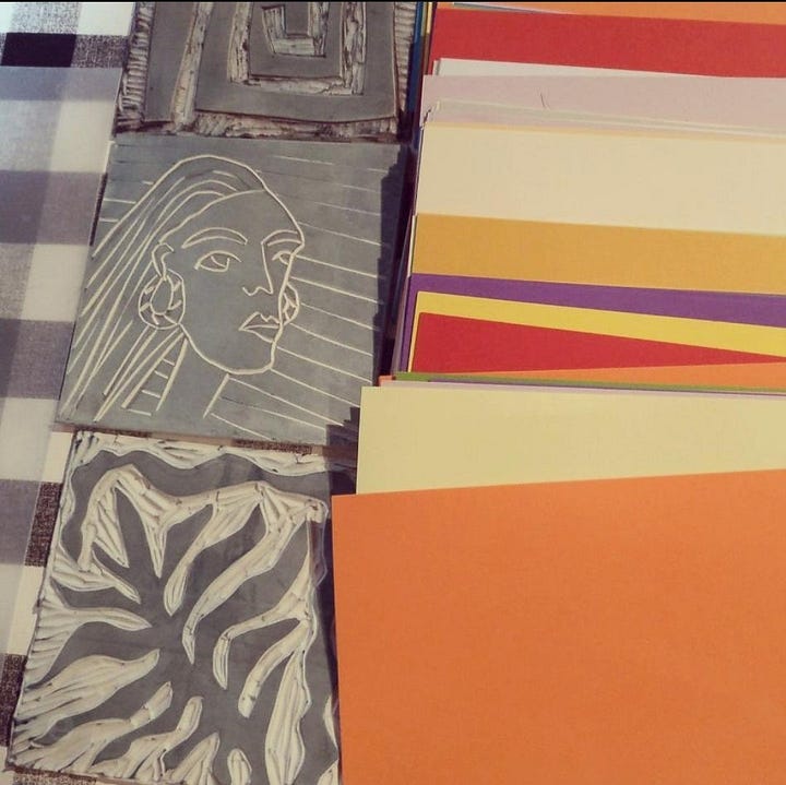 women drawing, a syllabus of the group's activities, teatime and lino cuts and coloured paper