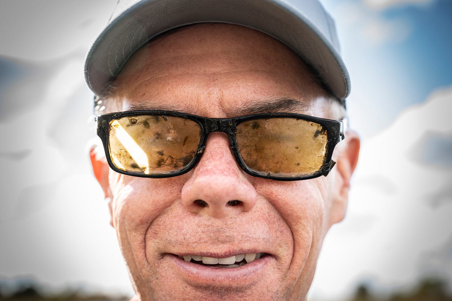 John Juracek with a pair of found glasses from the Henry's Fork in Idaho.