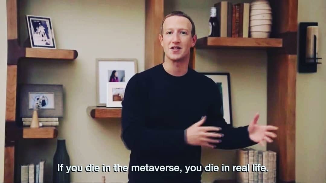 Image still from a promotional video featuring Meta CEO Mark Zuckerberg, who is animatedly describing something. A bogus "subtitle" reads, "If you die in the metaverse, you die in real life."