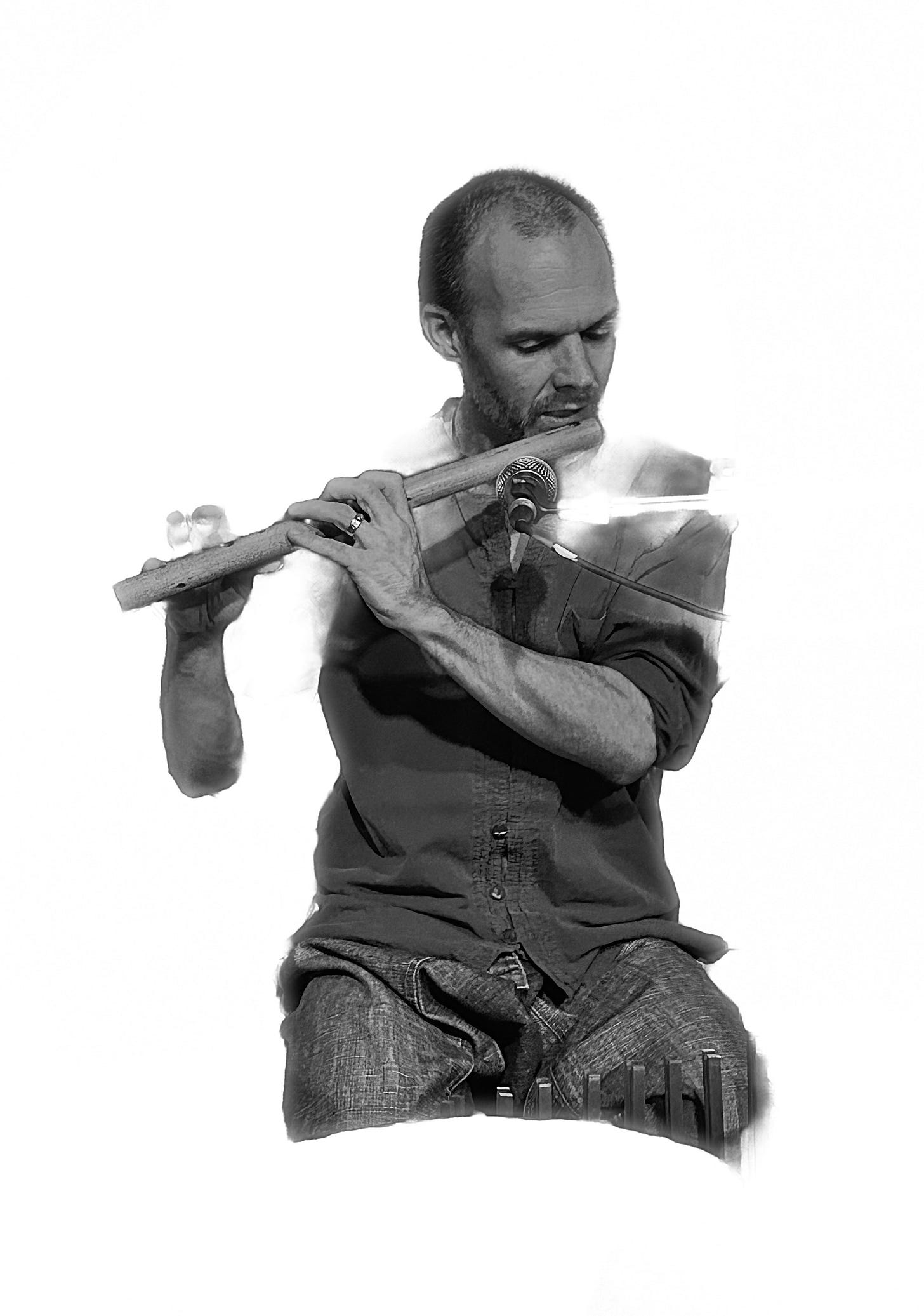 Mat Creedon playing a bamboo flute