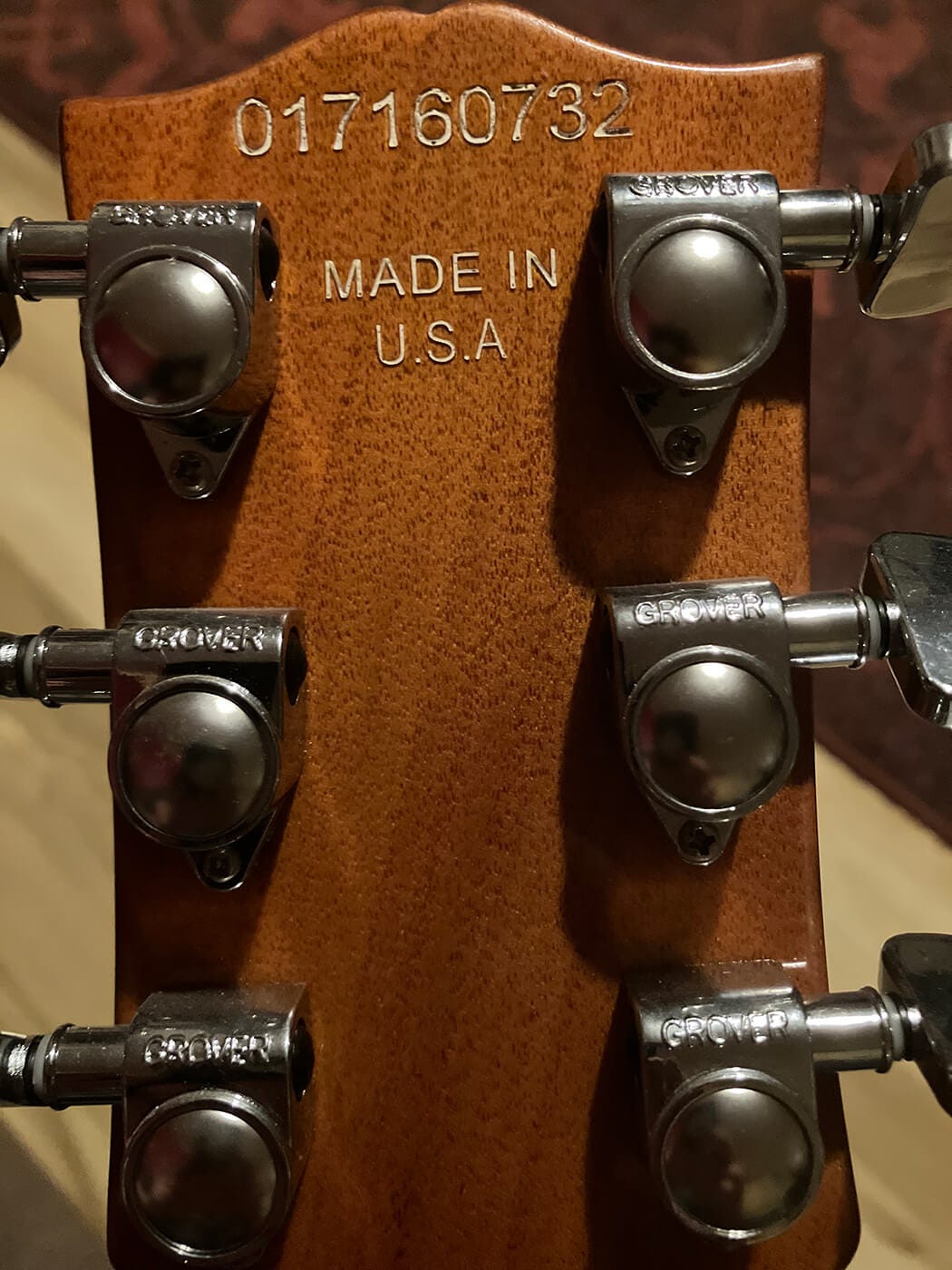 Serial number on the back of the headstock of a fake Gibson Les Paul, photo by Guitar.com