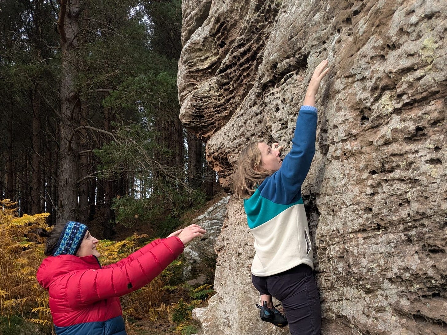 Grunnd club climbers tackling boulders in Wooler, Northumberland