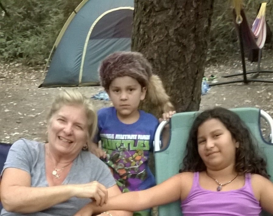 Grandma with 2 grandkids