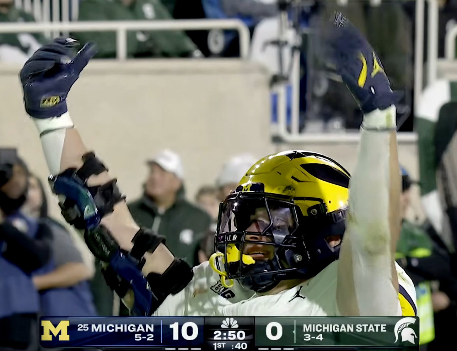 Jimmy Rolder Michigan right elbow brace during 2025 season