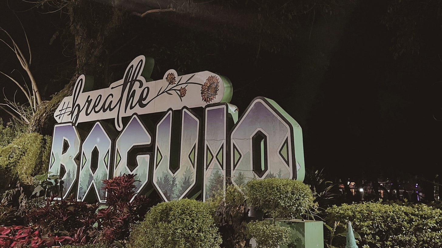 A sign that says Breathe Baguio