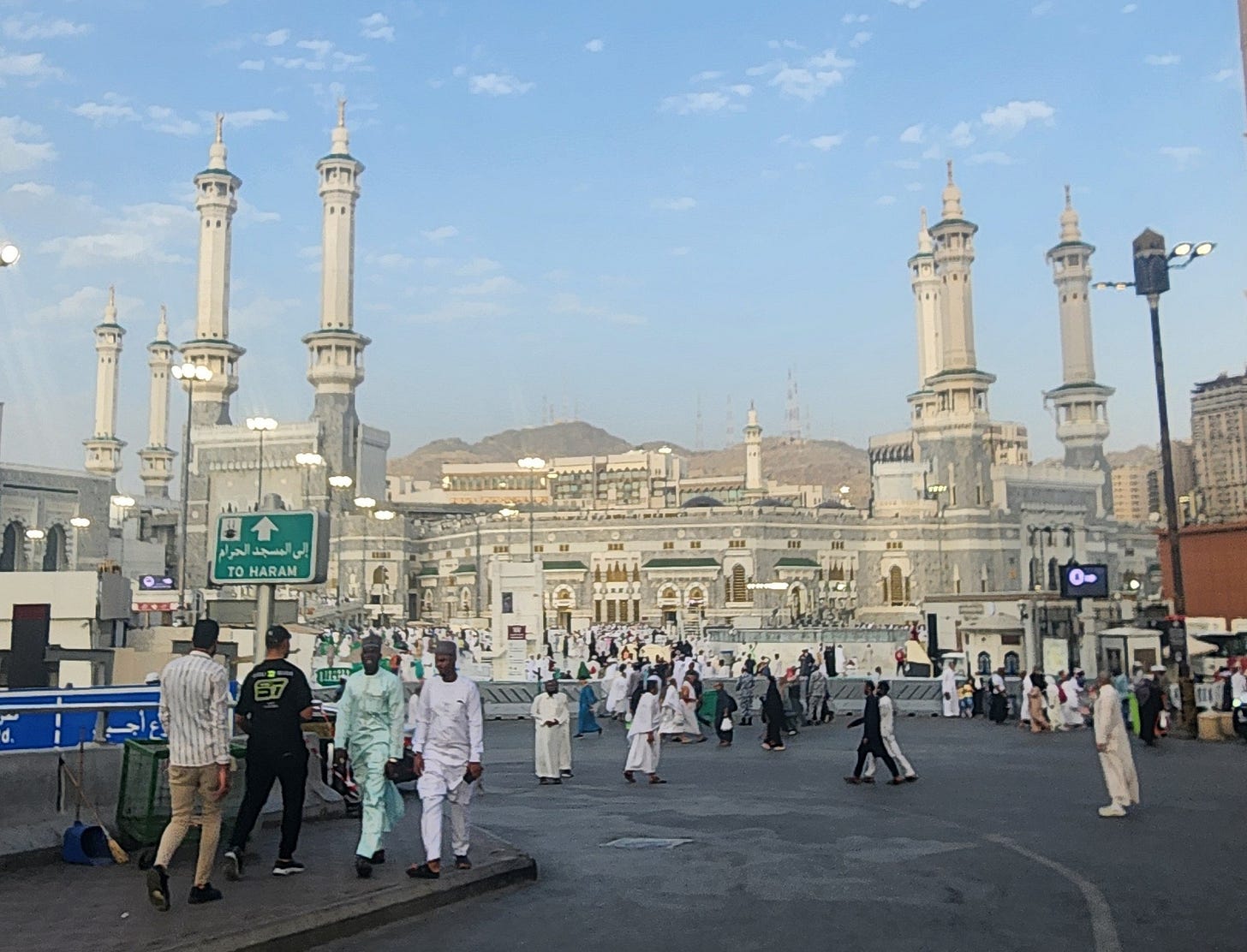 May be an image of 6 people and the Charminar