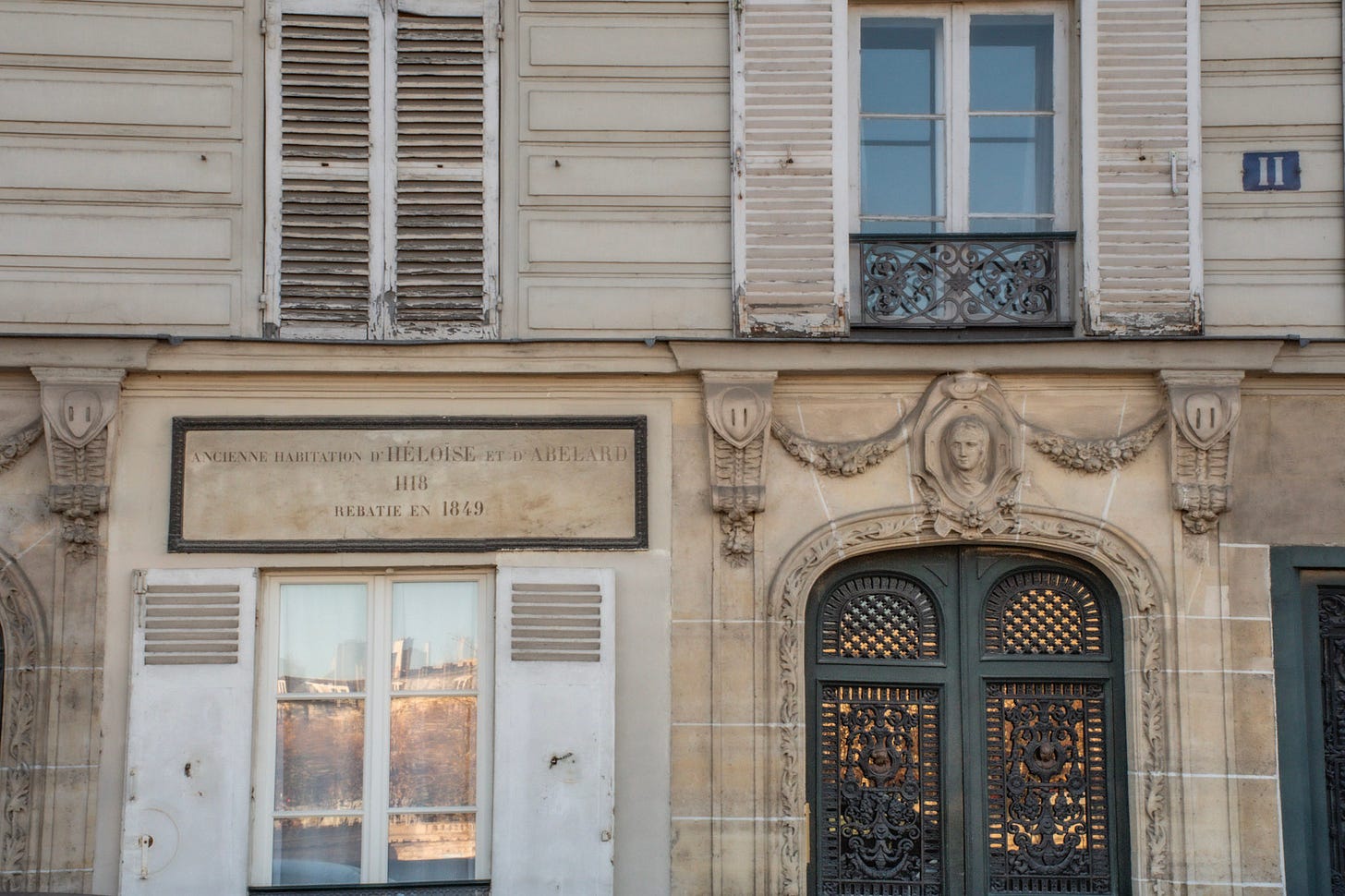 Plaque marking the former home of Héloïse and Abelard on Île de la Cité in Paris