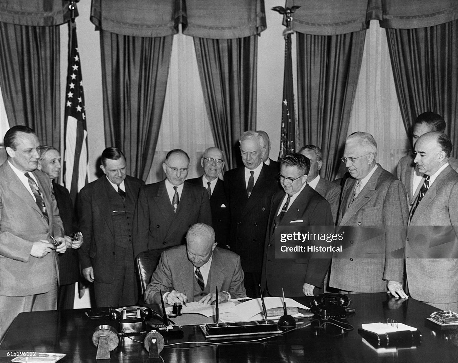 President Dwight Eisenhower signs H.R. 8127, known as the Highway Bill President Dwight Eisenhower signs H.R. 8127, known as the Highway Bill