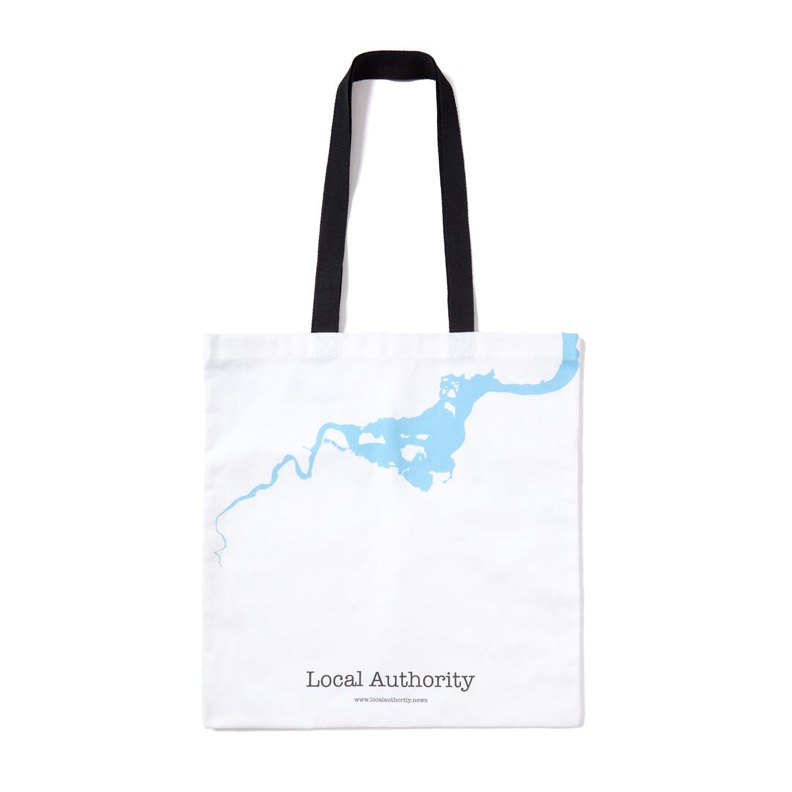 A white bag with blue paint on it

AI-generated content may be incorrect.