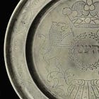 Four Questions about the Four Questions