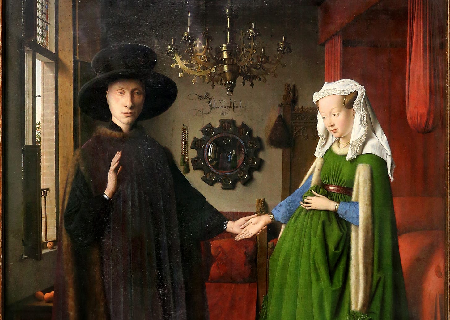 Fifteenth-century artist Jan van Eyck couldn’t resist sneaking himself into his famous Arnolfini Portrait. In a not-so-secret act of self-promotion, van Eyck wrote “Jan van Eyck was here 1434” on the wall in Latin behind the two figures. But far less noticeable are the other two figures in this painting. If you take a close look at the mirror on the wall, you’ll be able to spot two people who appear to be standing about where the “viewer” of this scene would be. It is widely believed that the one with his hand raised is supposed to be van Eyck. Fifteenth-century artist Jan van Eyck couldn’t resist sneaking himself into his famous Arnolfini Portrait. In a not-so-secret act of self-promotion, van Eyck wrote “Jan van Eyck was here 1434” on the wall in Latin behind the two figures. But far less noticeable are the other two figures in this painting. If you take a close look at the mirror on the wall, you’ll be able to spot two people who appear to be standing about where the “viewer” of this scene would be. It is widely believed that the one with his hand raised is supposed to be van Eyck.