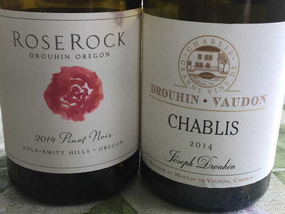 photo shows two wine bottles, closeups of the labels