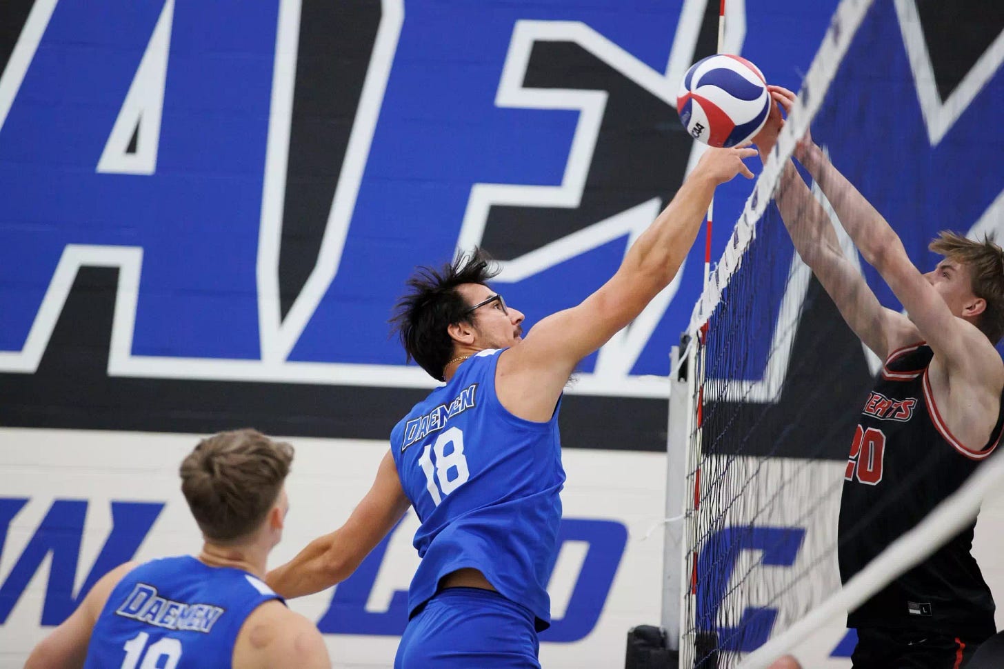 Billy Wieberg goes for the kill against Roberts Wesleyan Billy Wieberg goes for the kill against Roberts Wesleyan