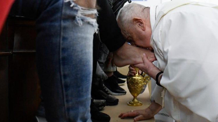Pope Francis during the washing of feet at the Mass of the Lord's Supper at Casal del Marmo Pope Francis during the washing of feet at the Mass of the Lord's Supper at Casal del Marmo