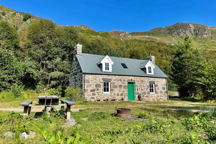 Croft house and communal picnic table.